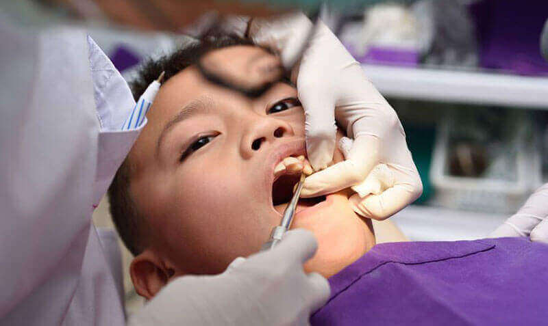 A child having dental work done.